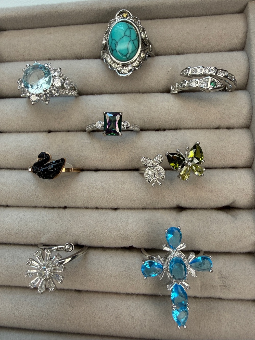 Lot of eight Silver tone Rings-adjustable or size 6-8